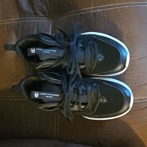 Mens Champion mid-top basketball shoes.  Worn on court once.  Child didn't like.